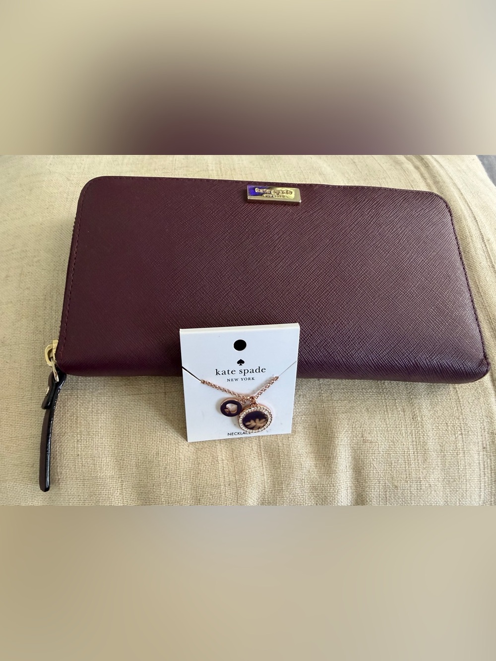 kate spade Plum Saffiano Leather Wristlet Pouch with NWT Kate spade necklace